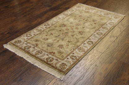 Close-up of wool pile, green and gray rug