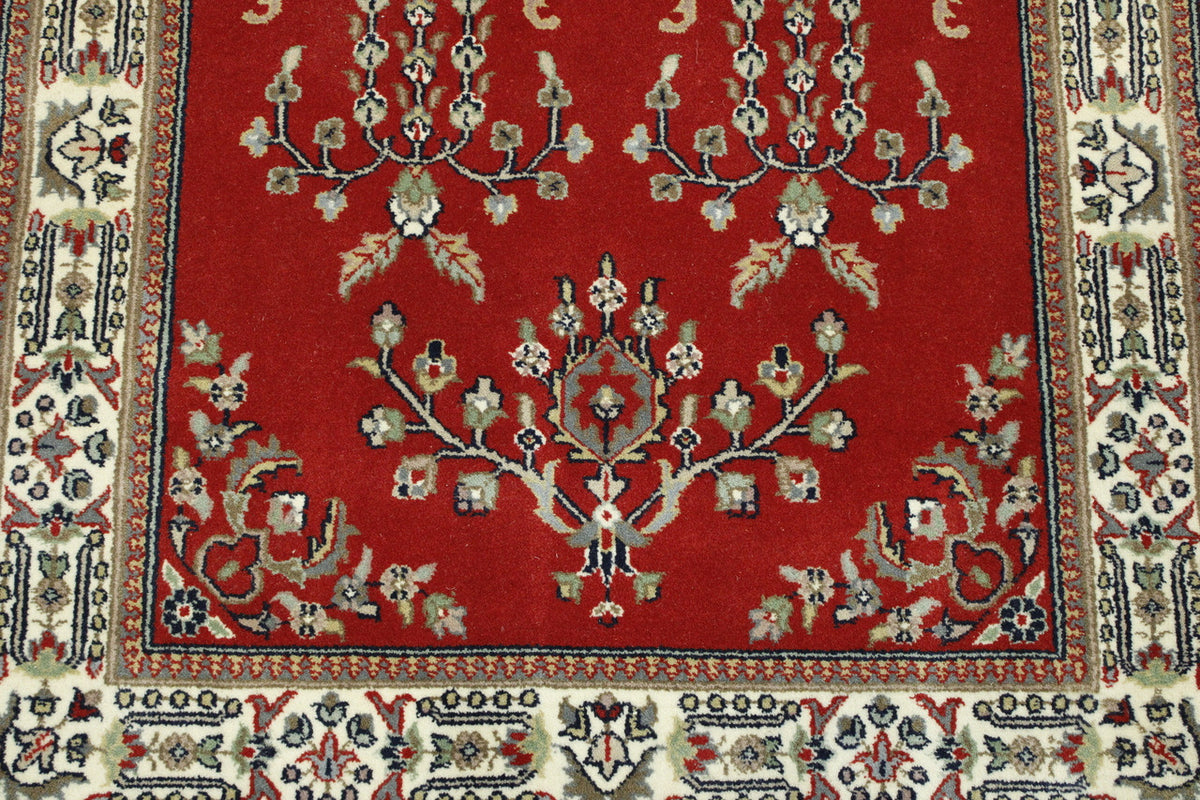 Beige & Red Traditional Fine Indo Sharukh rug in room setting