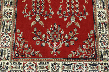 Beige & Red Traditional Fine Indo Sharukh rug in room setting