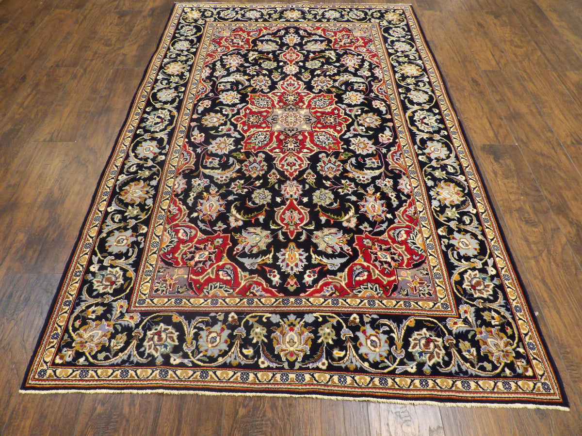 Fine Persian Qum rug corner detail
