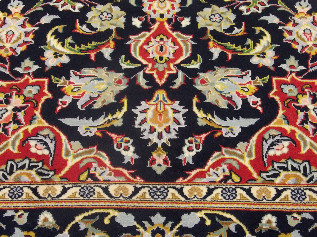 Fine Persian Qum rug border detail