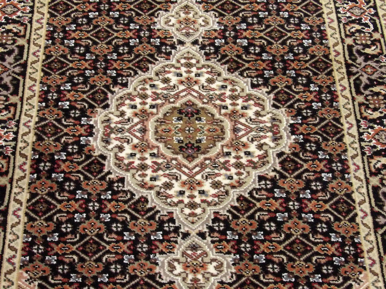 Back of Persian Tabriz hand-knotted runner