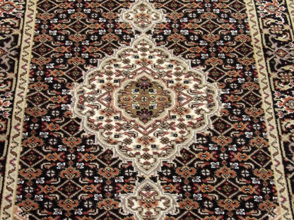 Back of Persian Tabriz hand-knotted runner