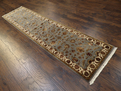 Beige and blue Kashan runner in a hallway setting