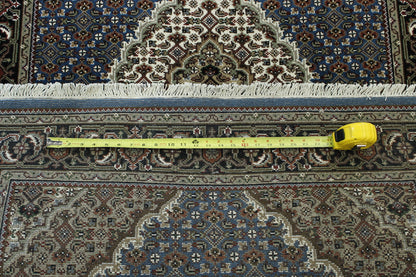 Traditional Tabriz hand-knotted wool rug in Black & Blue, full view