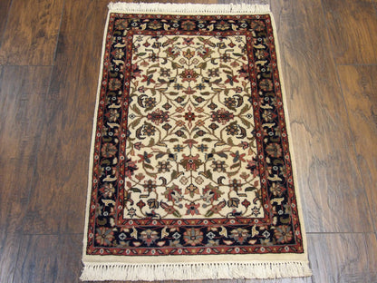 Close-up of wool pile, blue and ivory rug