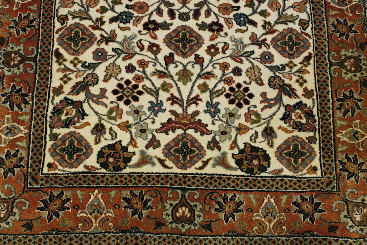 Beige & Rust Traditional Indo Mahal rug in room setting