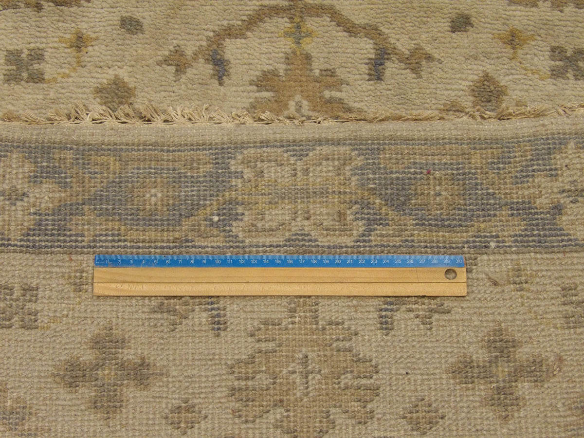 Gray and beige Oushak runner in hallway setting