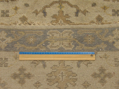 Gray and beige Oushak runner in hallway setting
