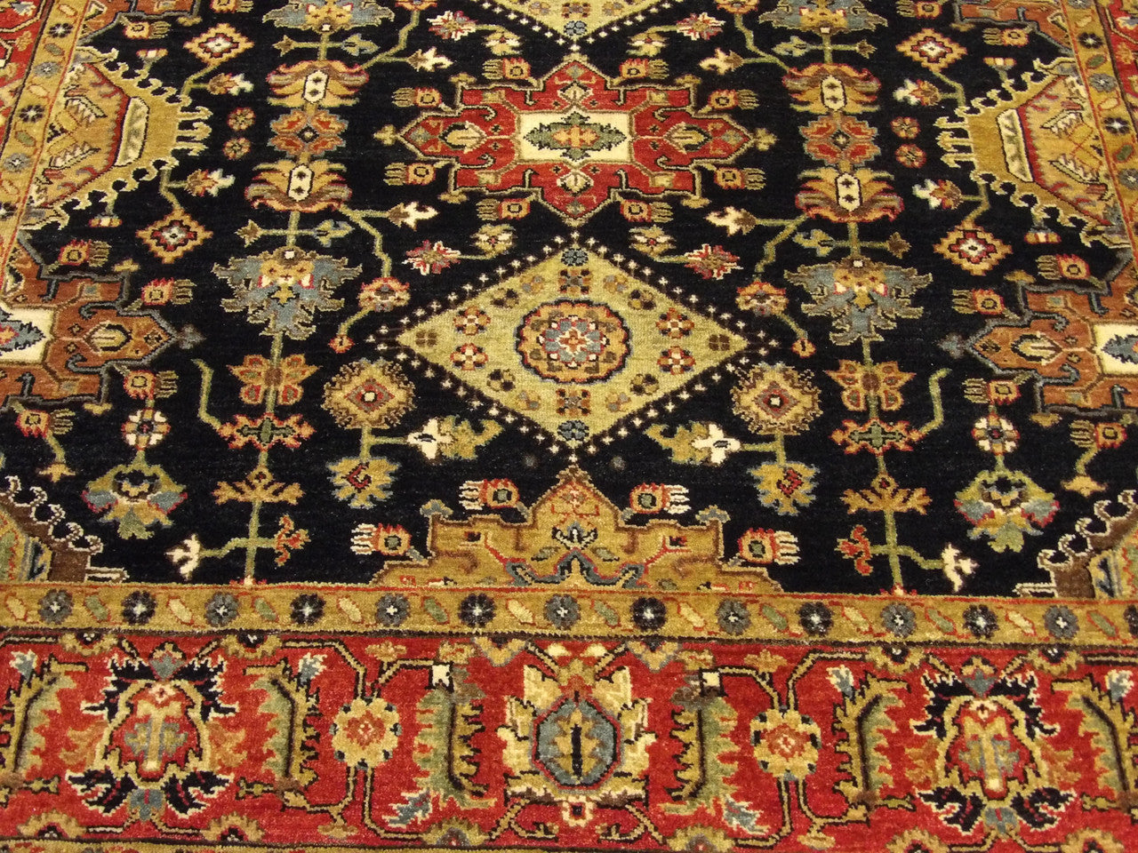 Sherapi hand-knotted rug corner detail showing border and fringe
