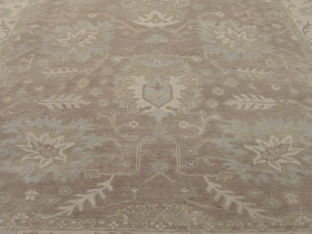 Back of Oushak hand-knotted rug