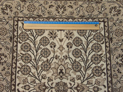 Brown & Beige Fine Turk Hereki rug in room setting