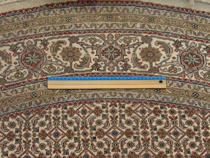 Beige Fine Persian Mir Bidjar rug in room setting