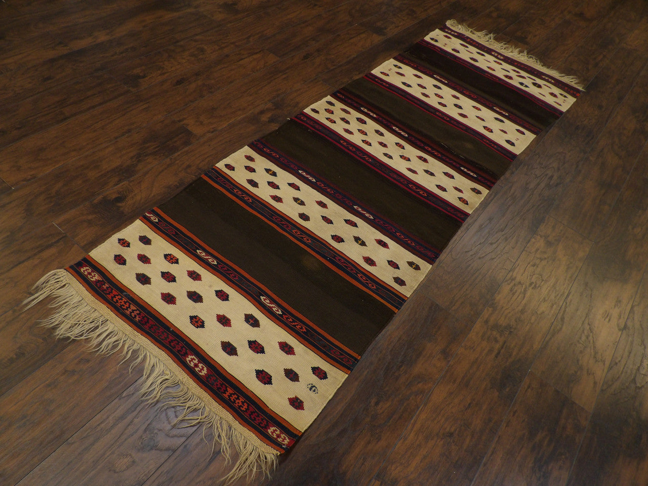 Antique kilim tribal pattern detail, beige and rust runner