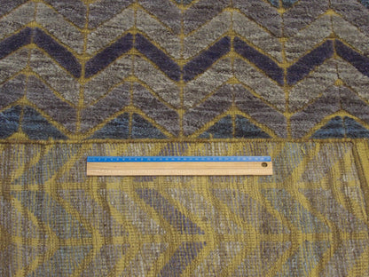 Blue and gold Moroccan rug in room setting