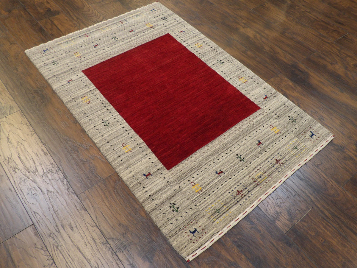 Beige Gabbeh rug in a room setting