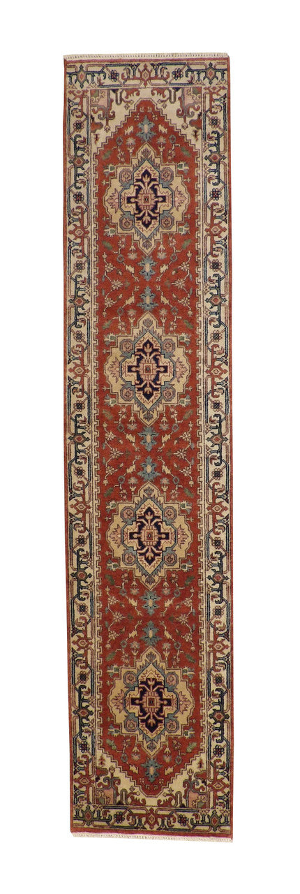 Tribal Heriz hand-knotted wool rug in Rust, full view