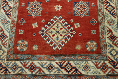 Tribal Super Kazak rug corner detail