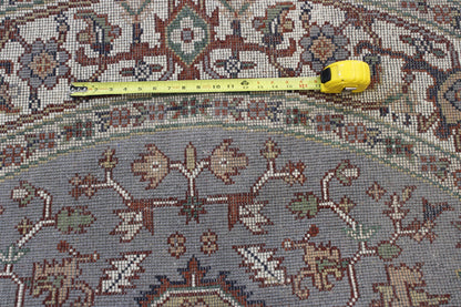 Gold & Green Tribal Indo Heriz rug in room setting