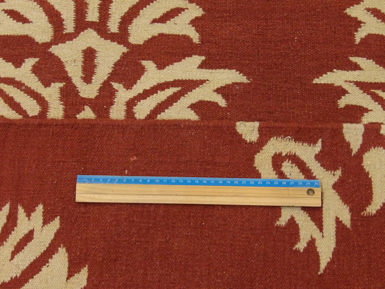 Beige & Red Coastal Flat Weave Indoor/Outdoor Beach rug in room setting