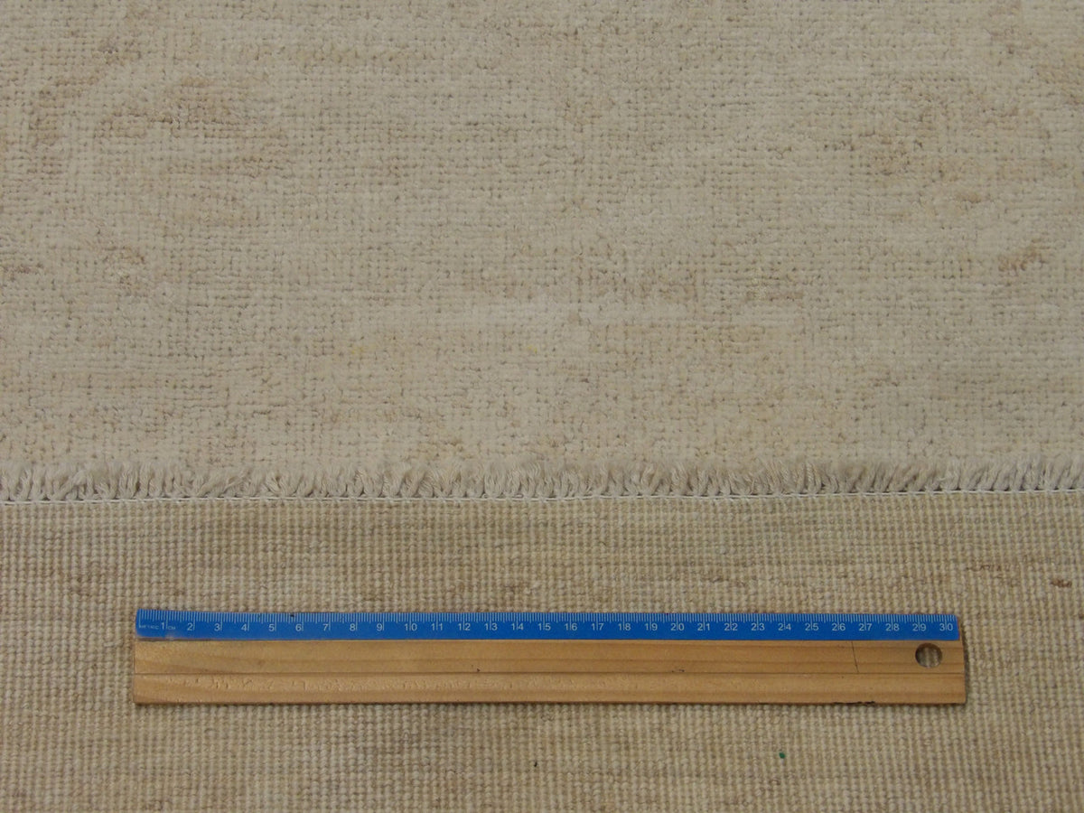 Beige Oushak Chobi Wash Natural Dye rug in room setting