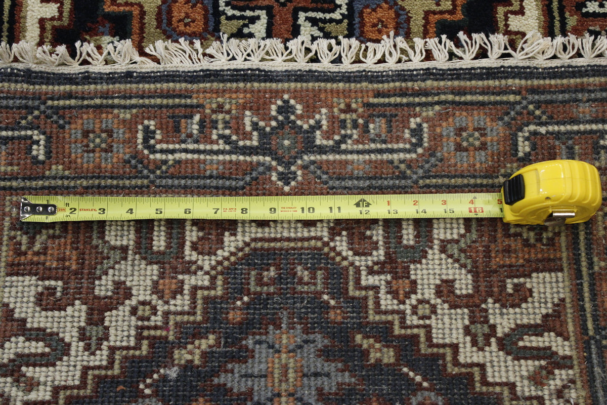 Traditional Heriz rug corner detail