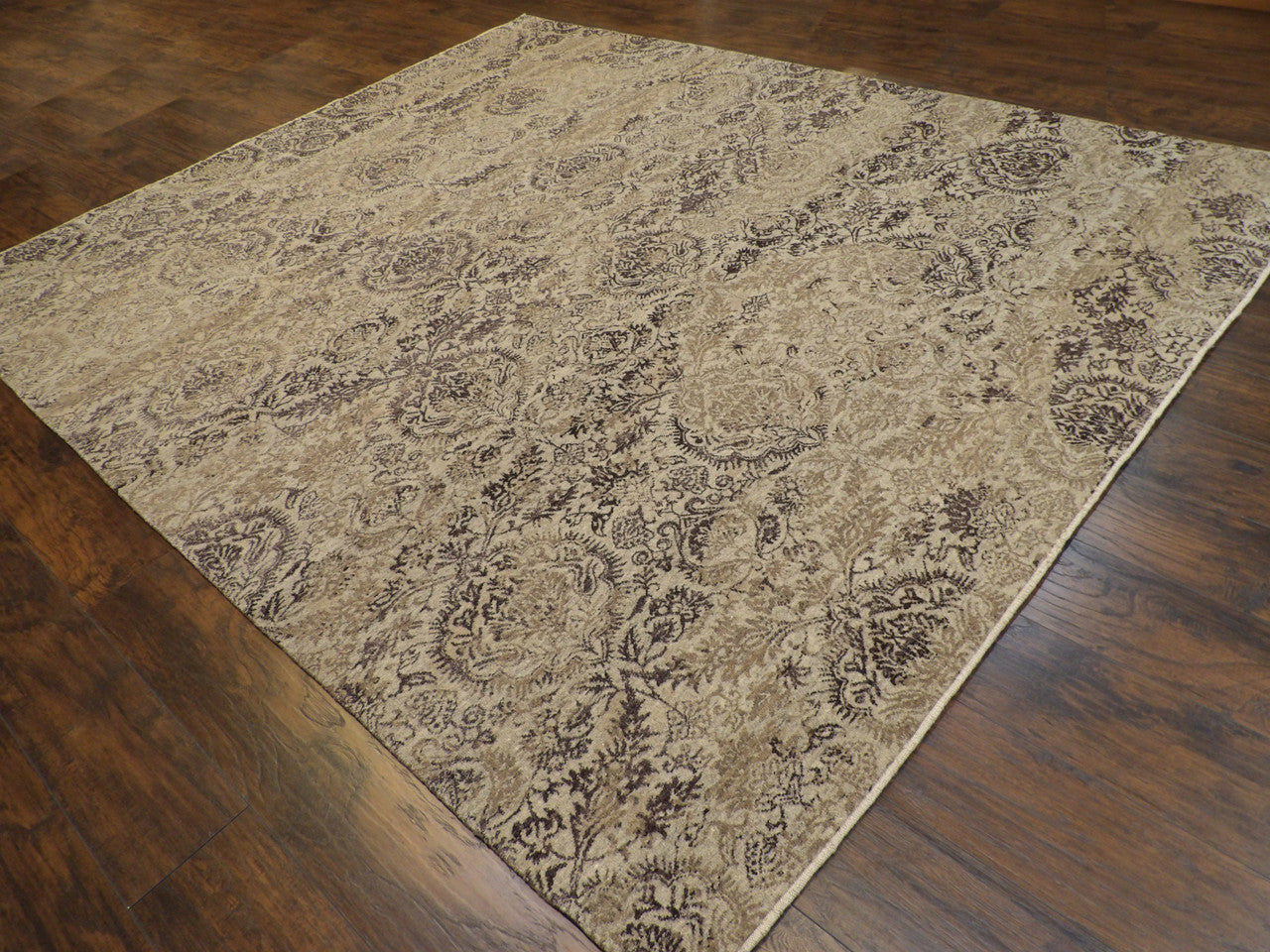 Full view of transitional damask rug