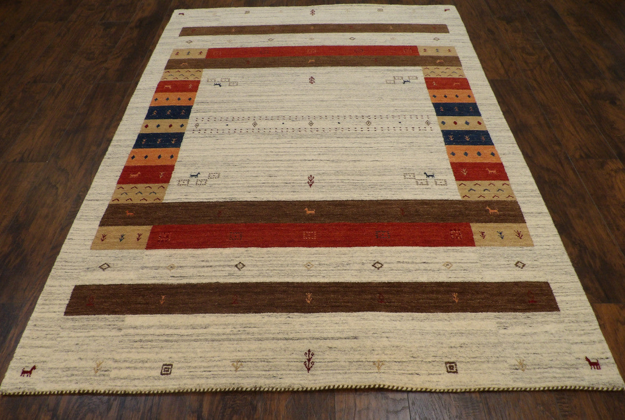 Close-up of wool pile, beige and red rug