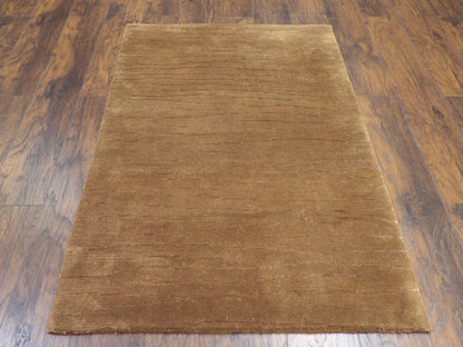 Close-up of wool-silk pile, brown rug