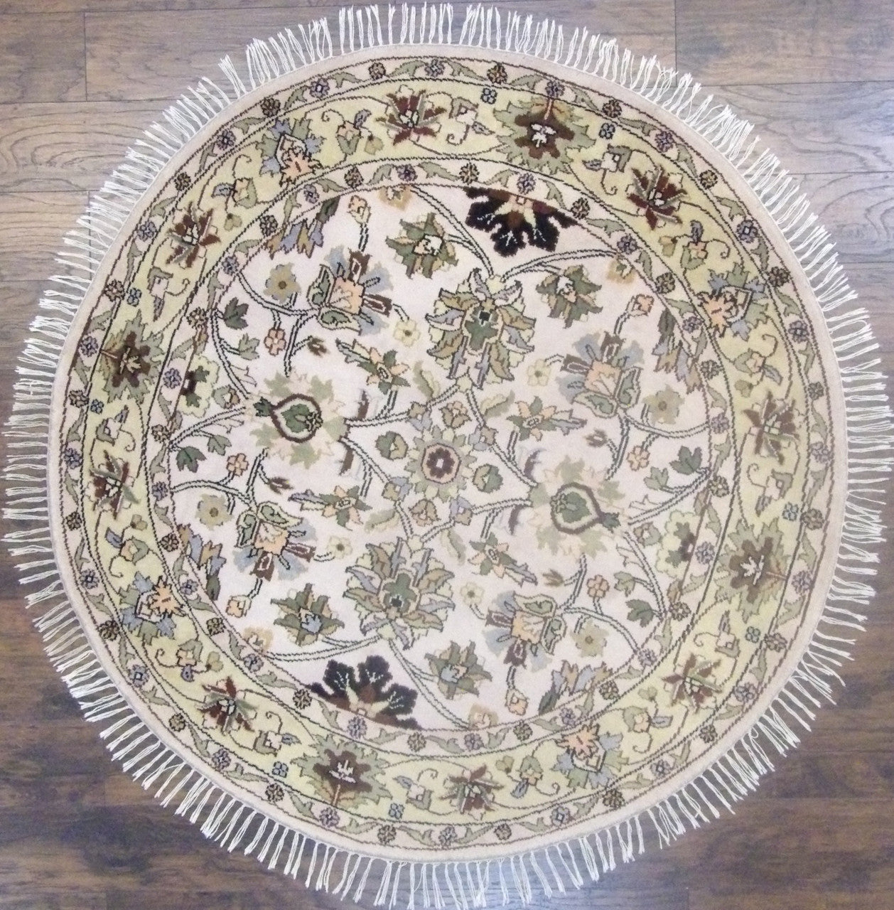 Turkish weave Ziegler hand-knotted wool round rug in beige and gold, full view