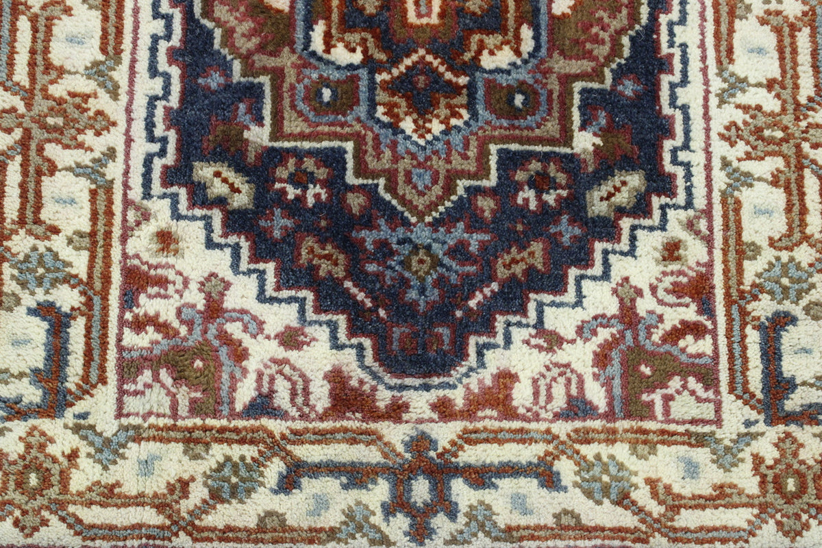 Blue & Beige Tribal Heriz rug in room setting