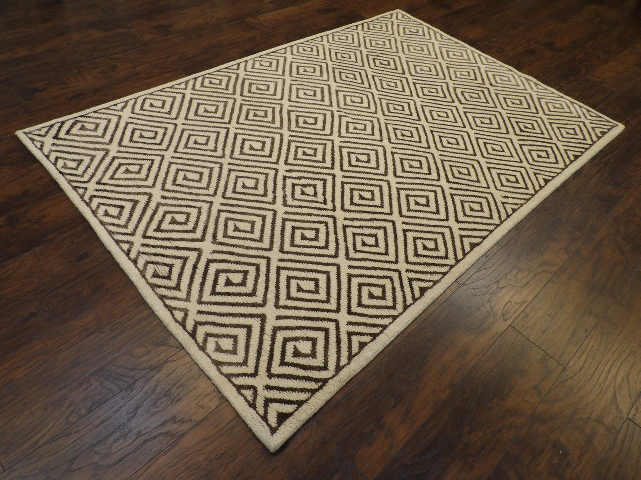 Moroccan diamond pattern detail, brown rug