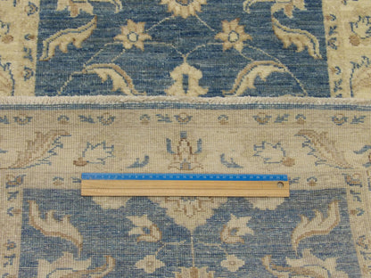 Blue and beige Oushak runner in hallway setting