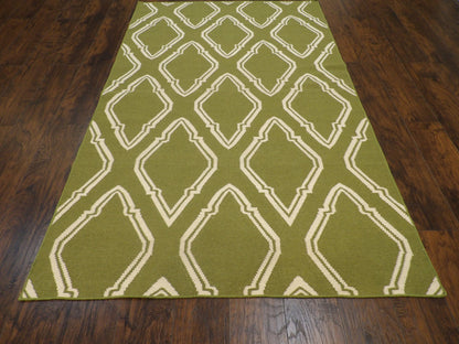 Close-up of wool pile, Green & Beige rug