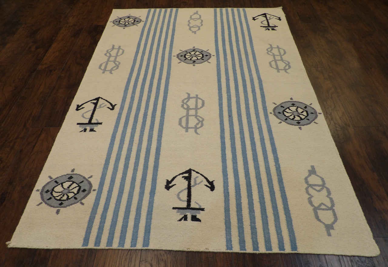 Back of hand-knotted coastal flatweave rug showing reversible weave