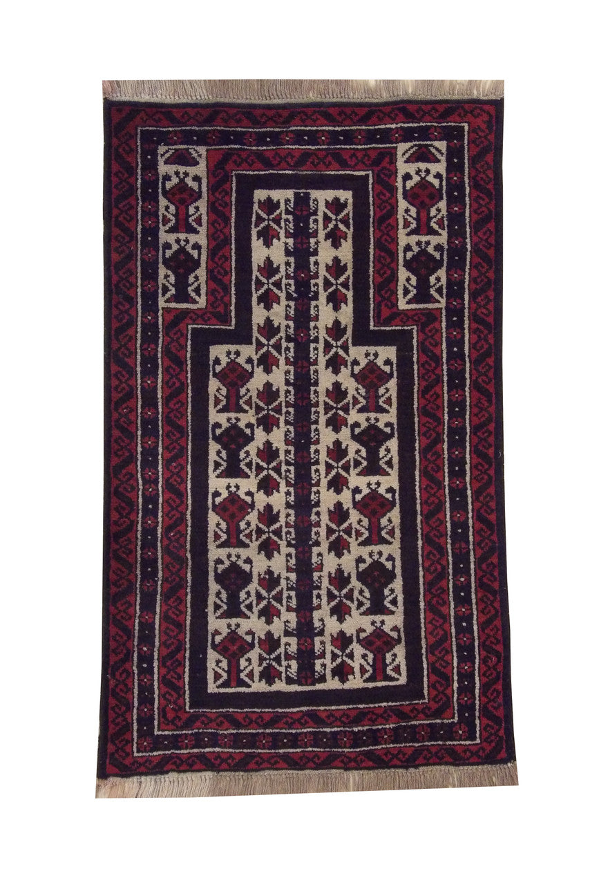 Tribal hand-knotted wool rug in Red, full view