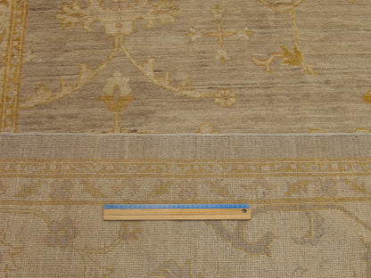 Gray and beige Oushak rug in room setting