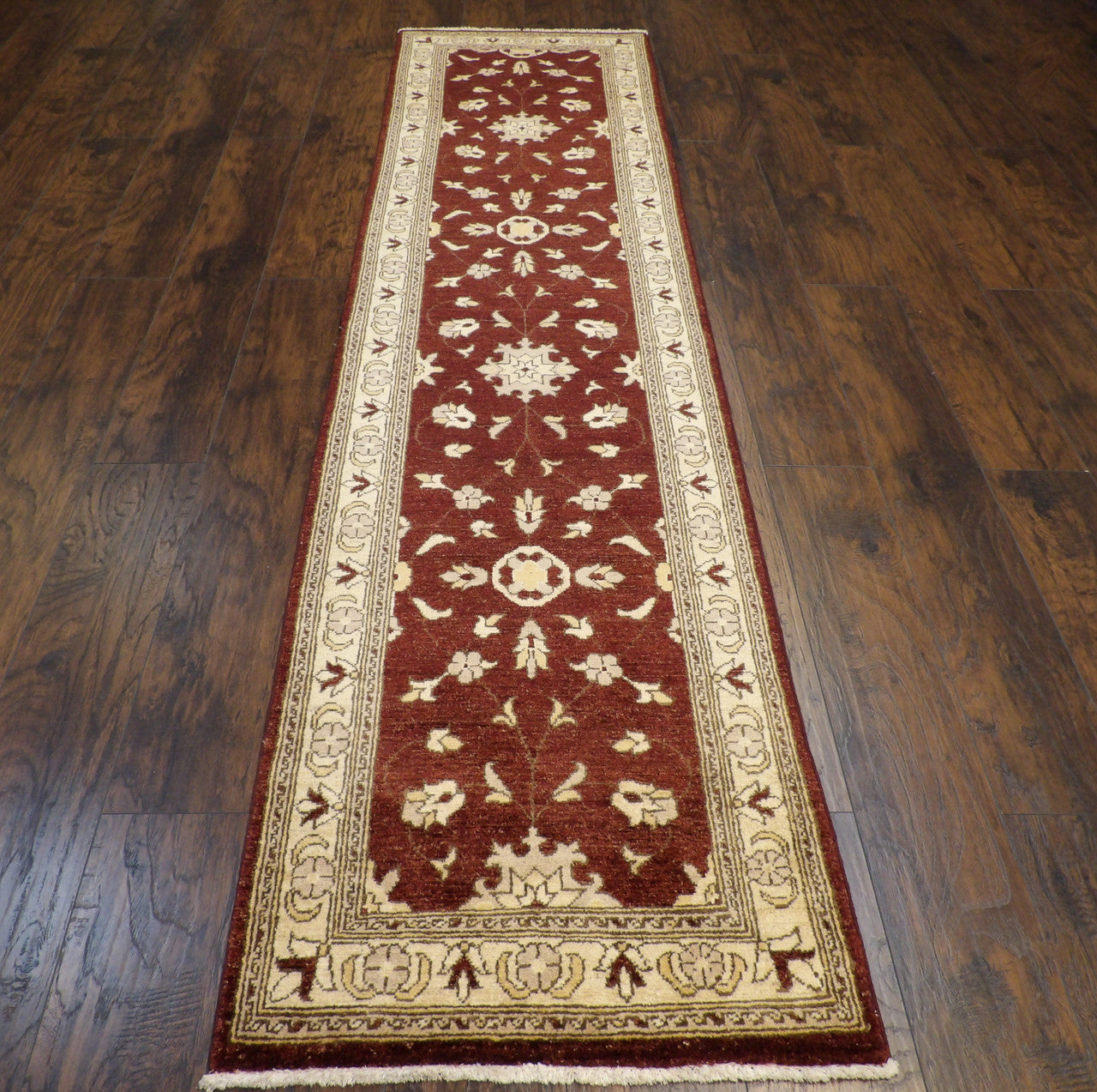 Close-up of wool pile, brown and ivory runner