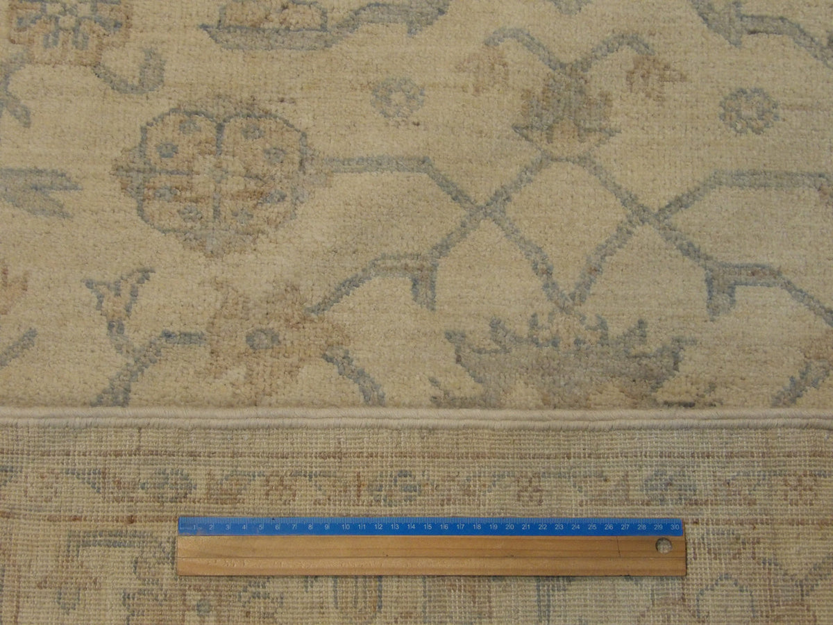 Beige Indo Chobi Natural Dye rug in room setting
