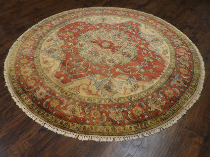 Sherapi geometric pattern detail, gold and rust round rug