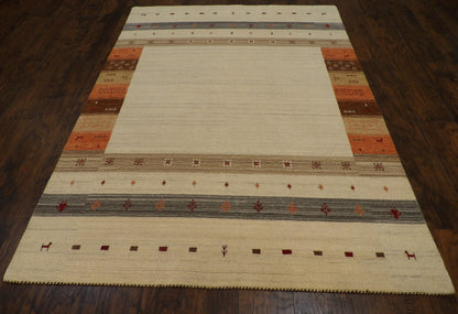 Close-up of wool pile, ivory and rust rug