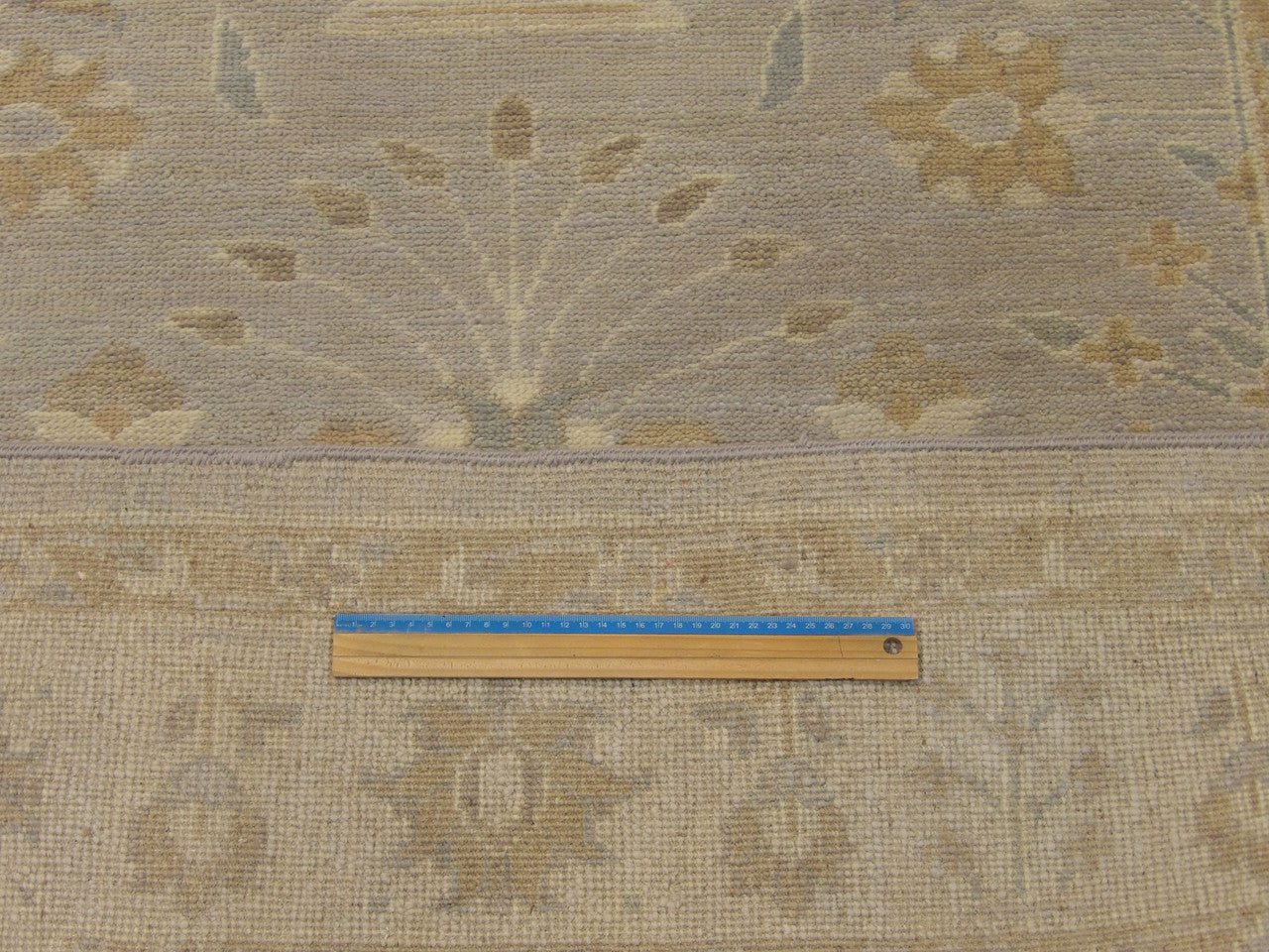 Full room view of Oushak Chobie hand-knotted rug