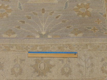 Full room view of Oushak Chobie hand-knotted rug