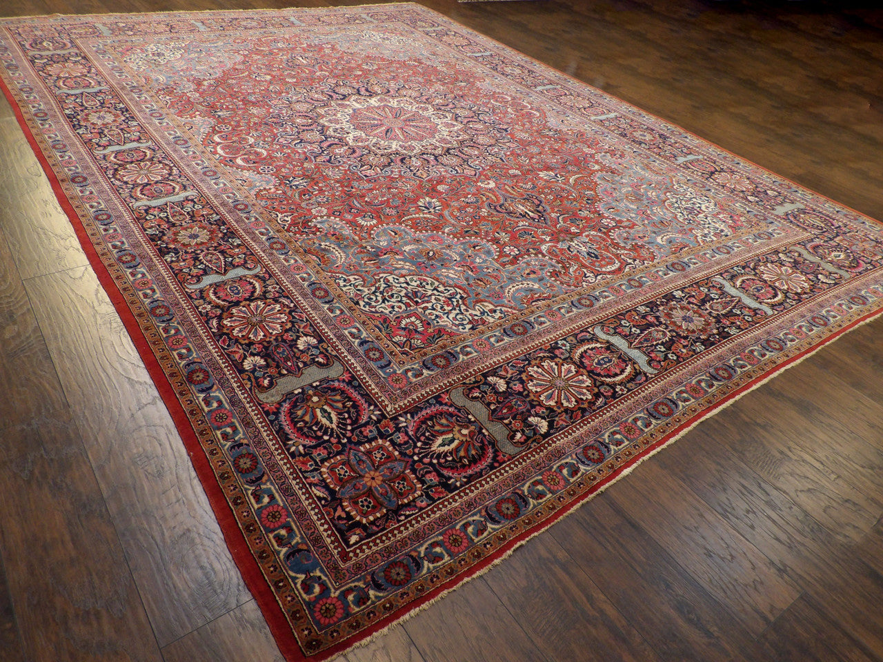 Antique Tabriz rug border detail