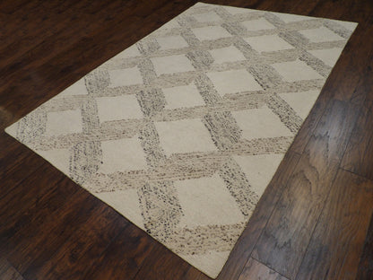 High-low loop pattern detail, beige rug