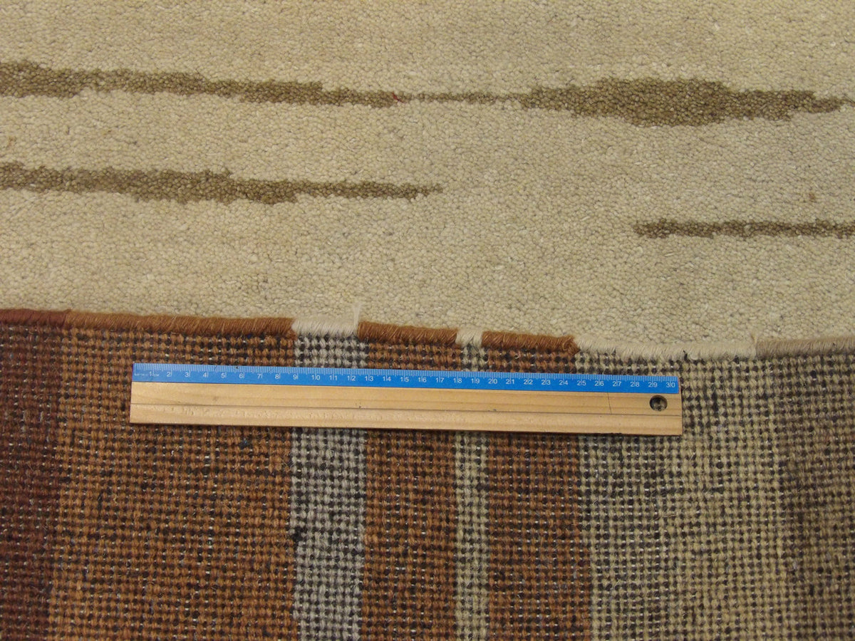 Beige & Rust Modern rug in room setting