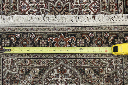 Traditional Indo Qum rug corner detail