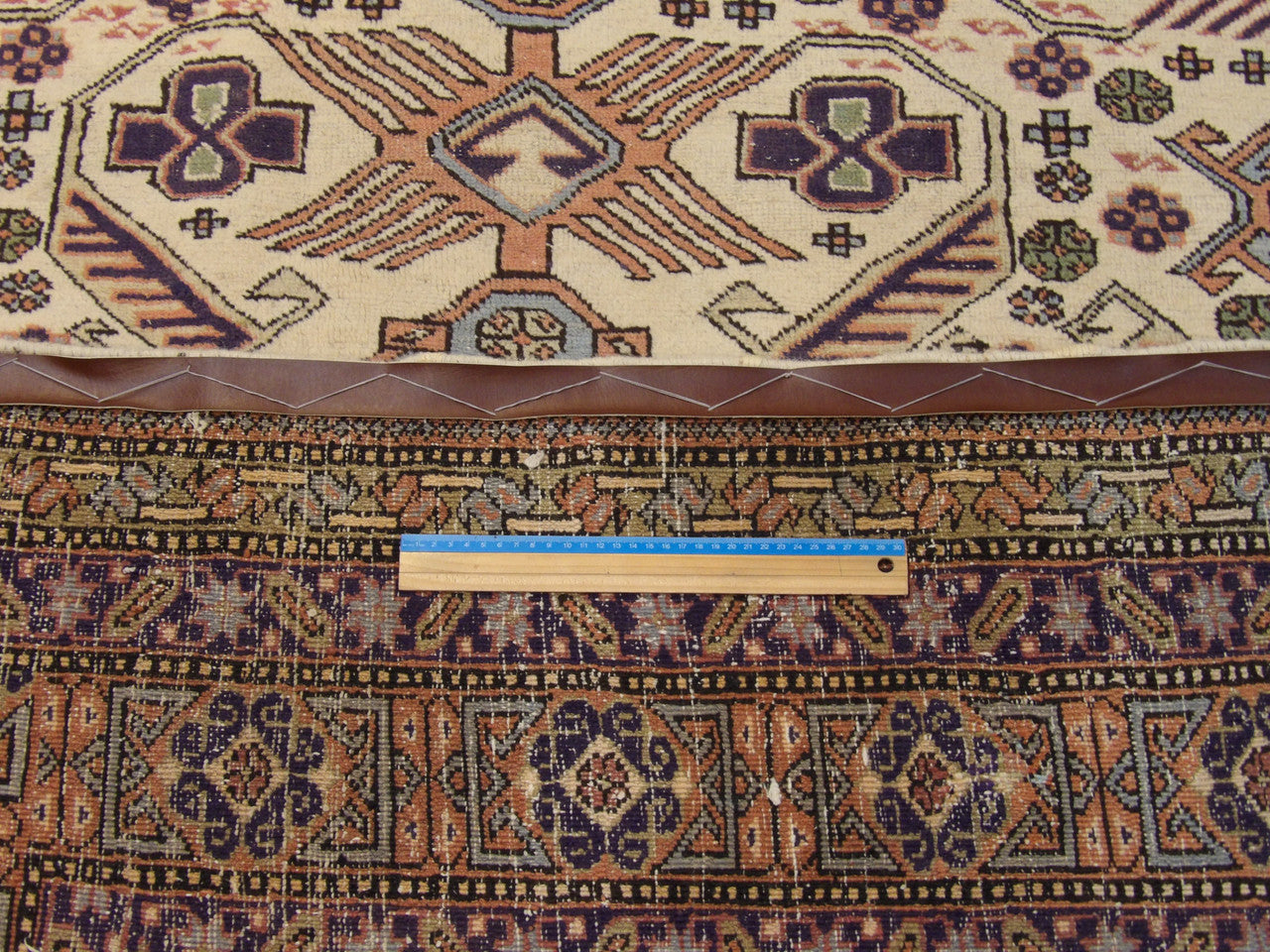 Blue and ivory antique Sparta rug in room setting