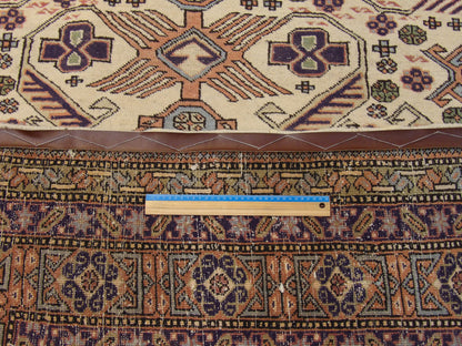 Blue and ivory antique Sparta rug in room setting