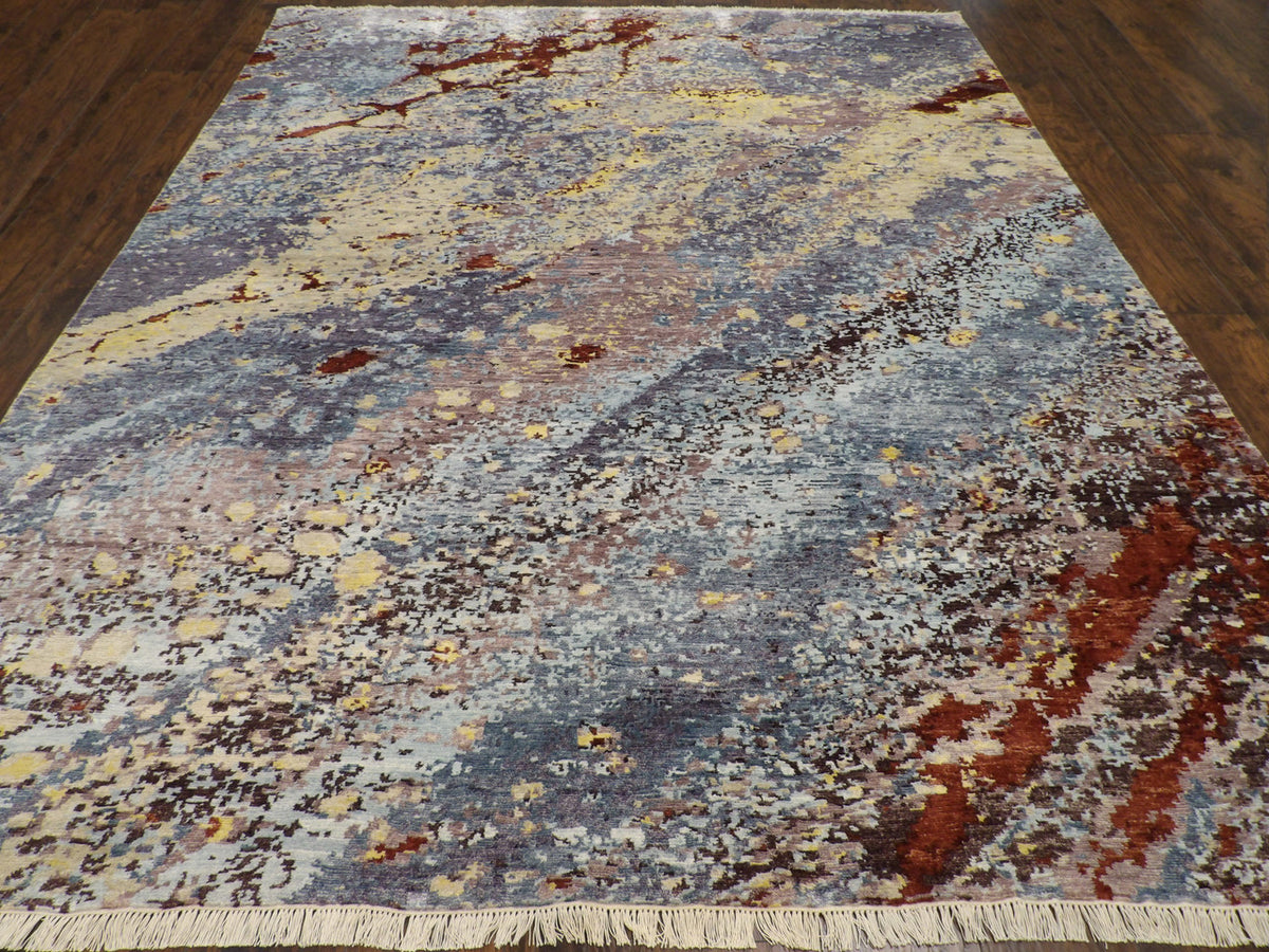 Close-up of carved wool-silk pile, blue and brown rug